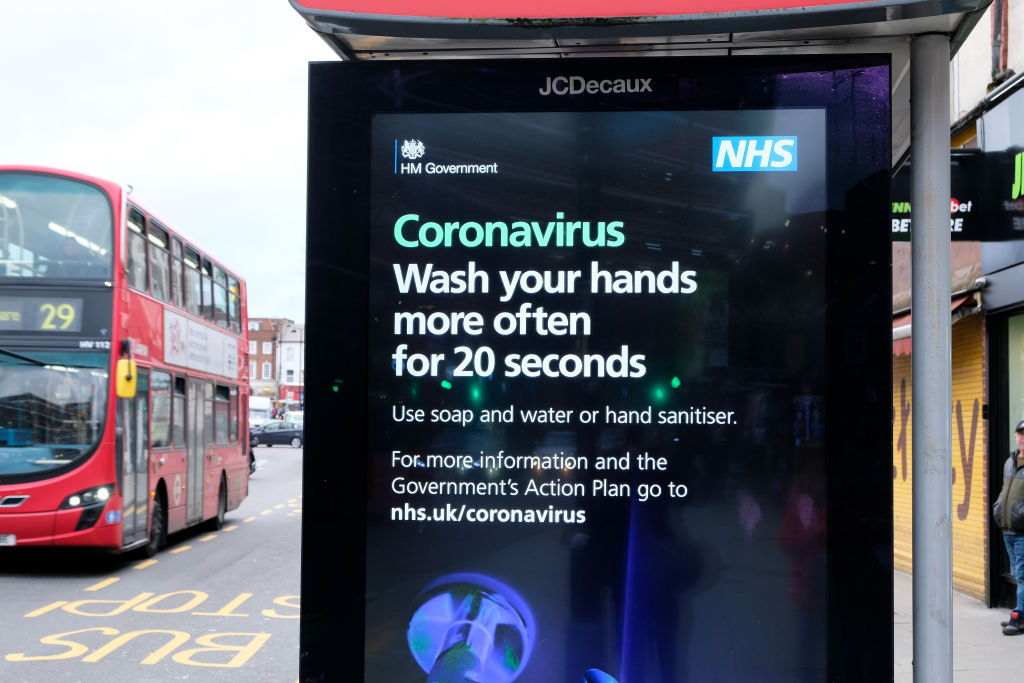 Coronavirus campaign by the government on billboards in Wood Green, north London (Matthew Chattle—Barcroft Media via Getty Images)