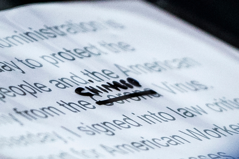 A close-up of President Trump's notes shows where the word "Corona" was crossed out and replaced with "Chinese" during a briefing at the White House on March 19, 2020. (Jabin Botsford—The Washington Post/Getty Images)