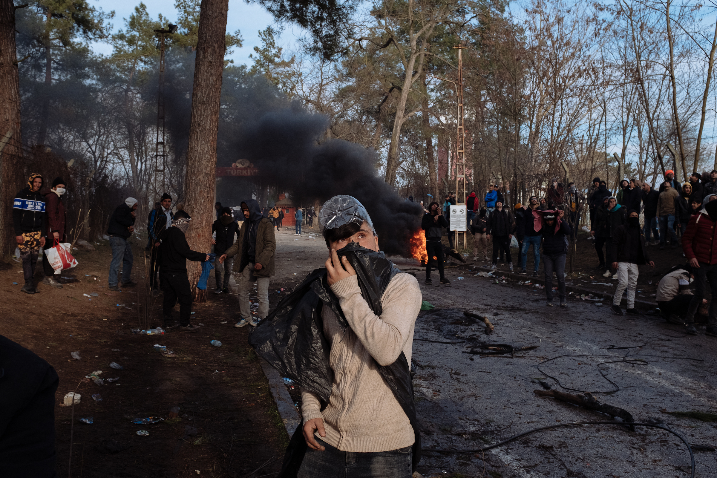 A clash with Greek police near the border. (Emin Ozmen—Magnum Photos for TIME)