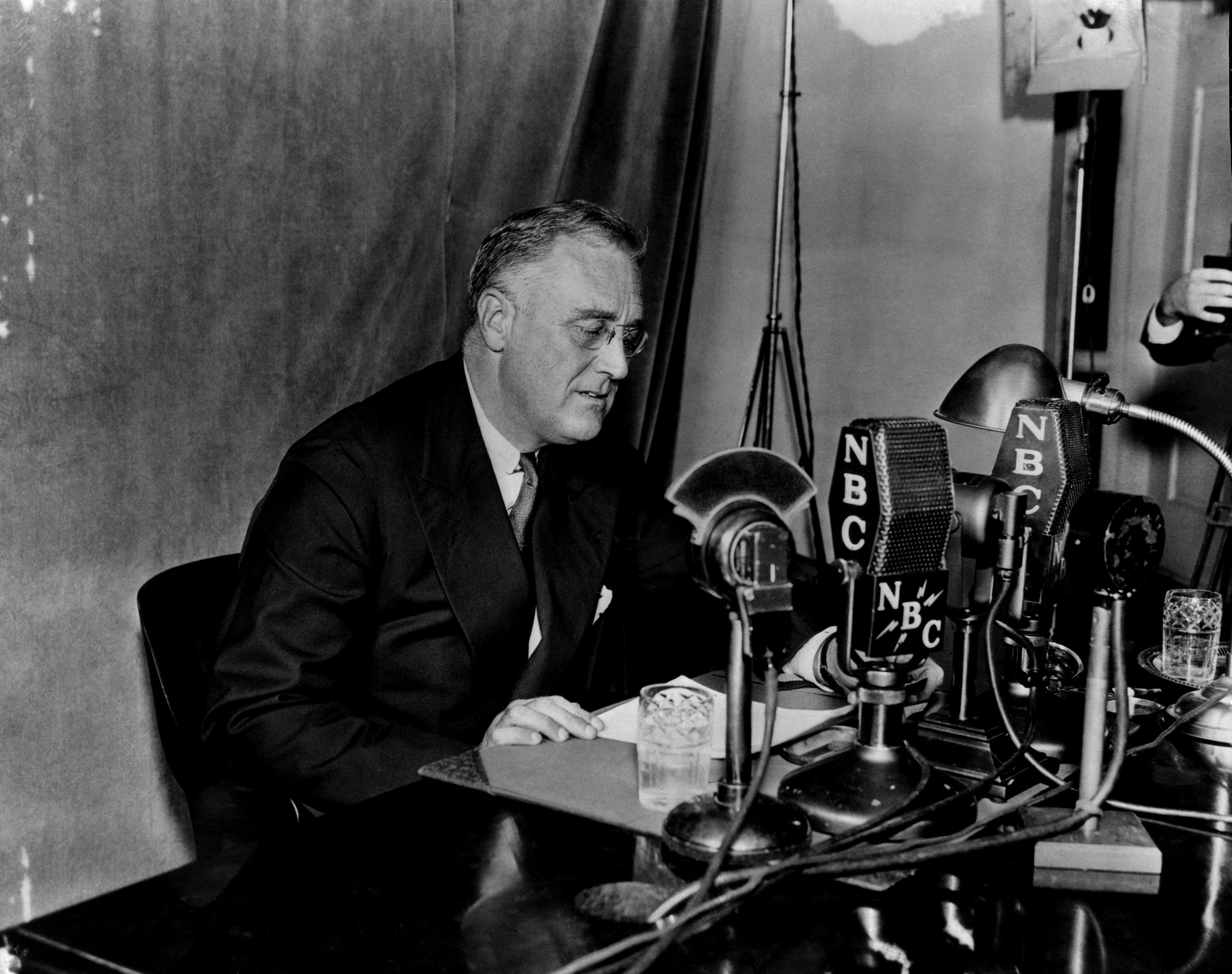 President Franklin D. Roosevelt during one of his "fireside chats" broadcasted on NBC Radio (NBCUniversal via Getty Images)
