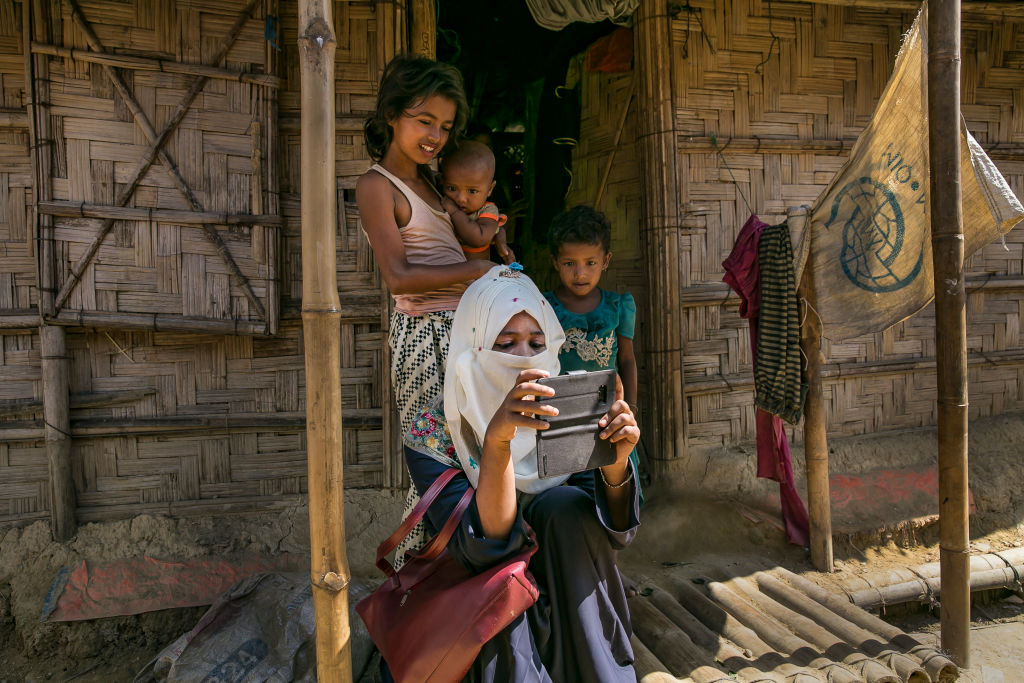 Omal Khair takes photos in a Rohingya refugee camp in Cox's Bazar, Bangladesh on Oct. 28, 2019. (Allison Joyce&mdash;Getty Images)