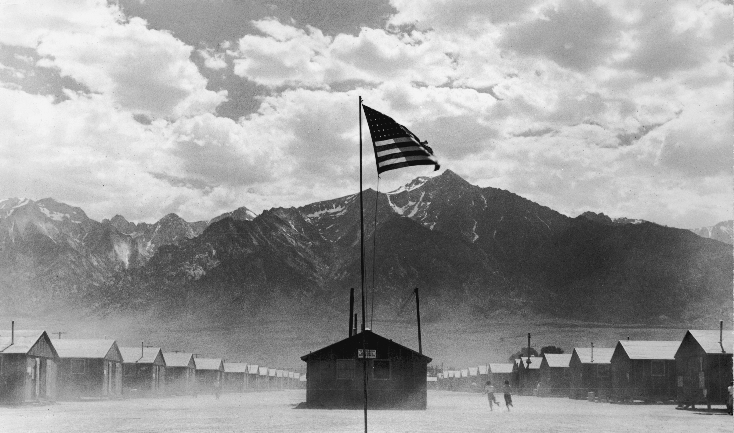 A U.S. flag flies at a Japanese-American detention camp in Manzanar, Calif., in 1942 (Getty Images)