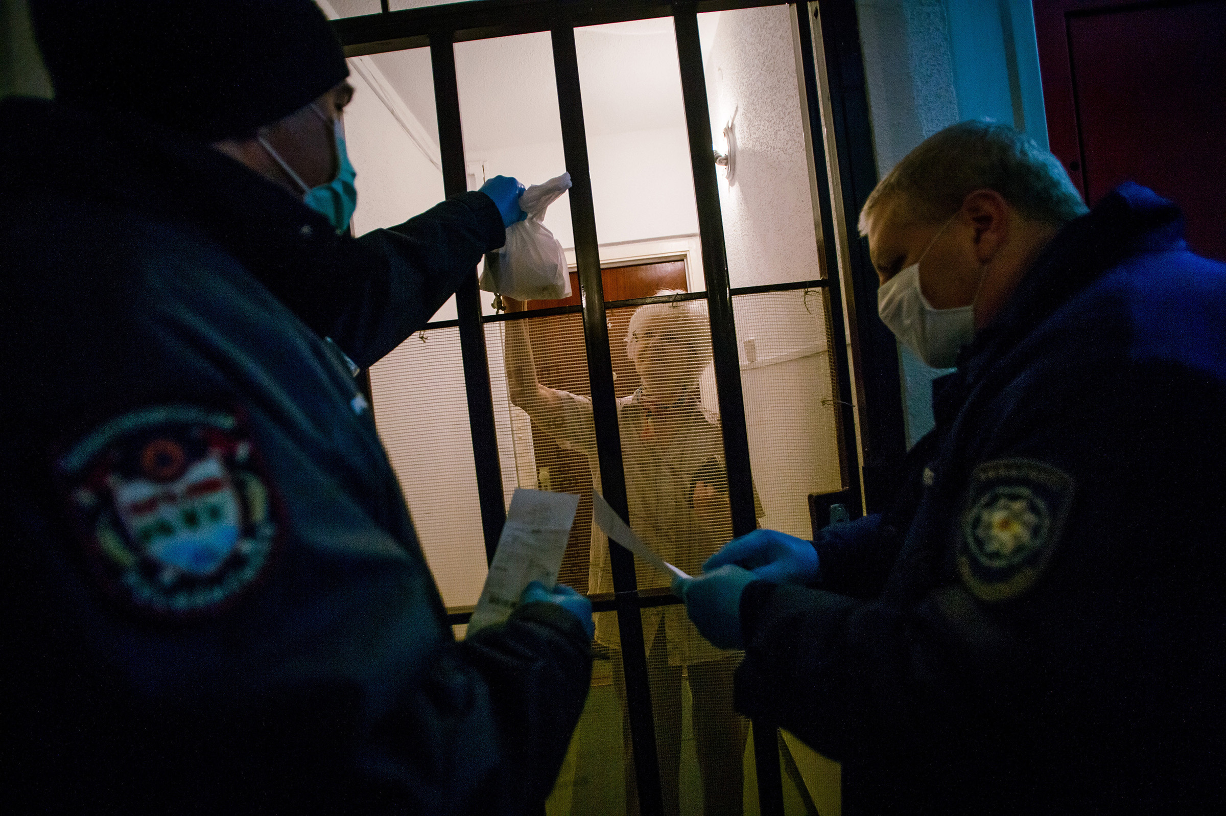 In Budapest, civil guards deliver food to the homebound (Zoltan Balogh—EPA-EFE/Shutterstock)