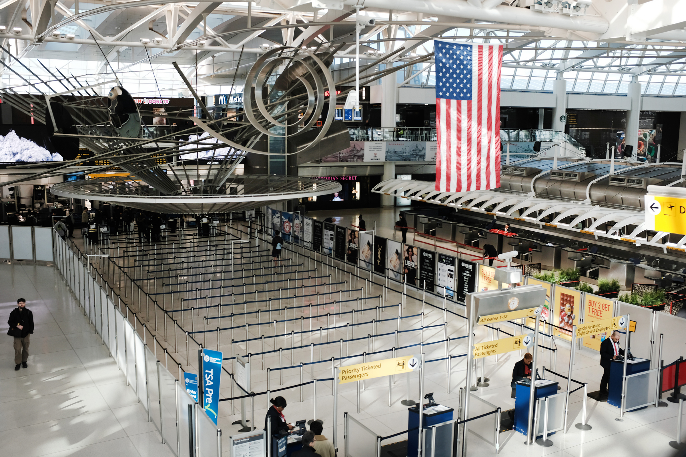 A sparse international departures terminal at John F. Kennedy International Airport in New York City on March 7. Days later, as concerns over the coronavirus grew, President Trump announced restrictions on travelers from Europe.