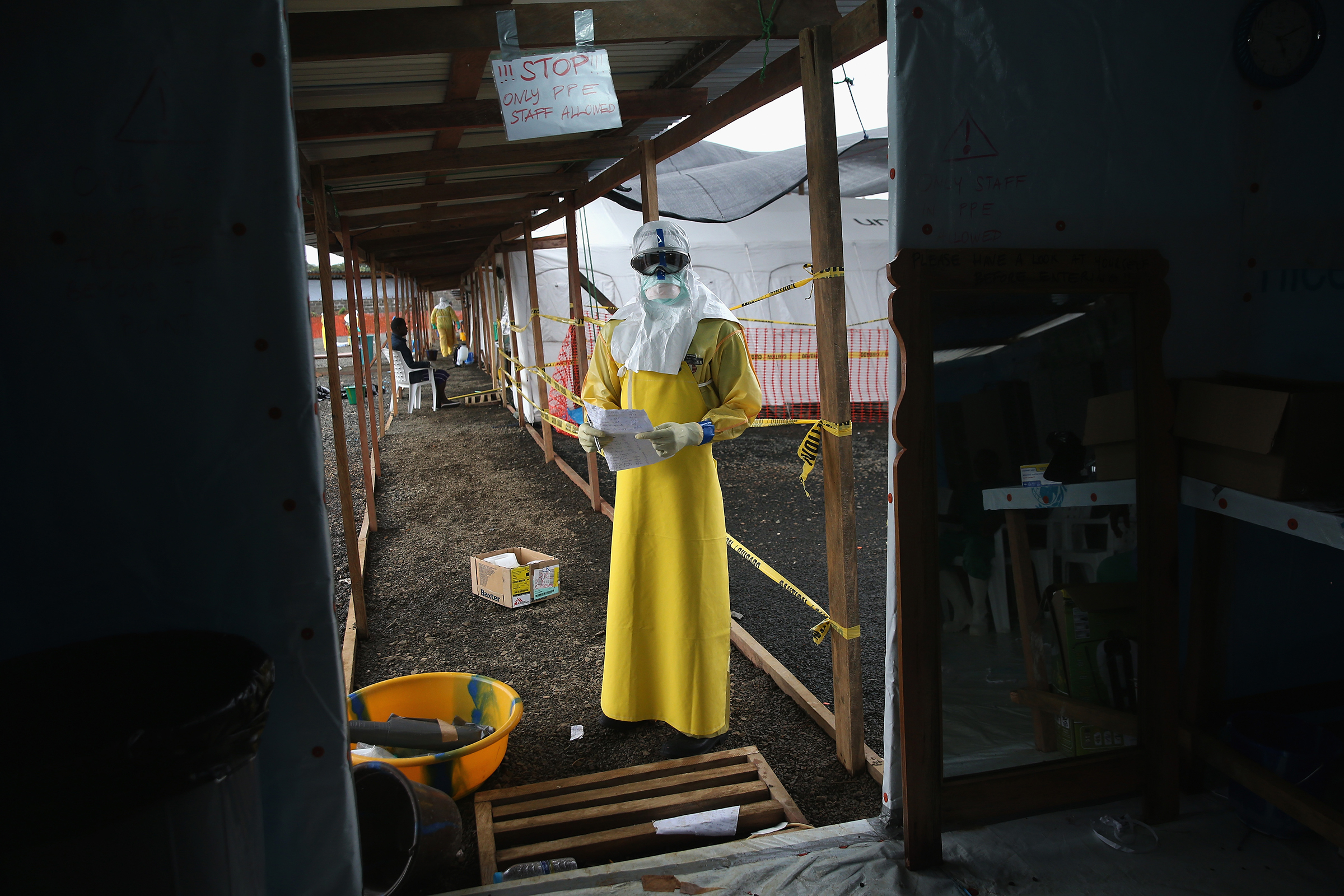A staffer for Doctors Without Borders (MSF) stands in protective clothing in the new MSF Ebola treatment center on August 21, 2014 near Monrovia, Liberia. (John Moore—Getty Images)