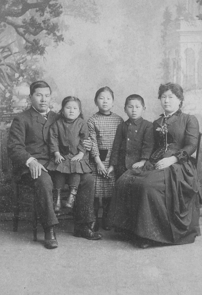 An 1884 portrait of the Tape family, including Joseph Tape, Emily Tape, Frank Tape, Mamie Tape, and Mary Tape. (Smith Collection/Gado—Getty Images)