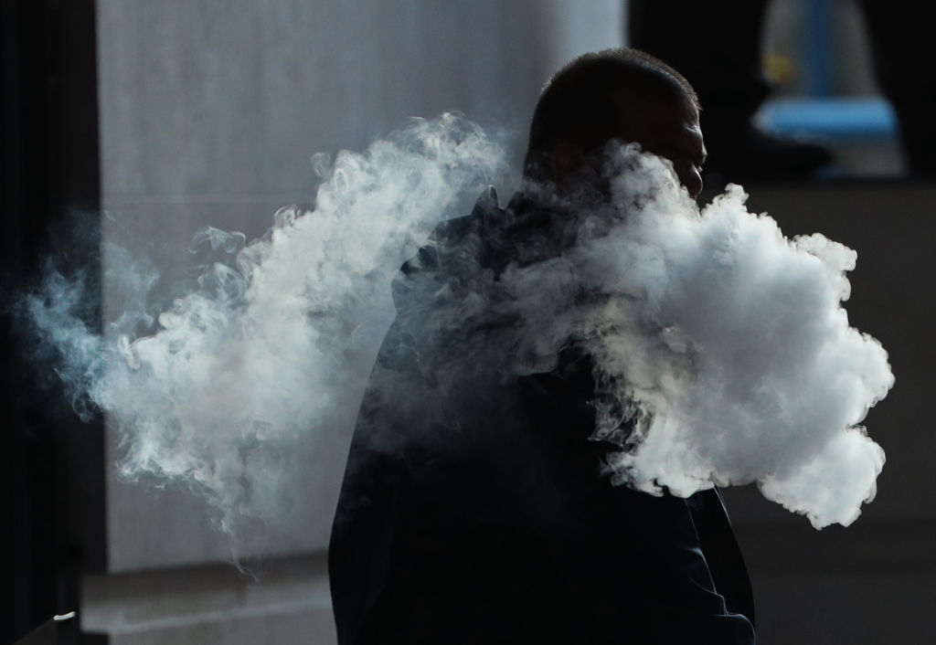 The vapor cloud produced by a man with an e-cigarette in London. (Photo by Yui Mok/PA Images via Getty Images)