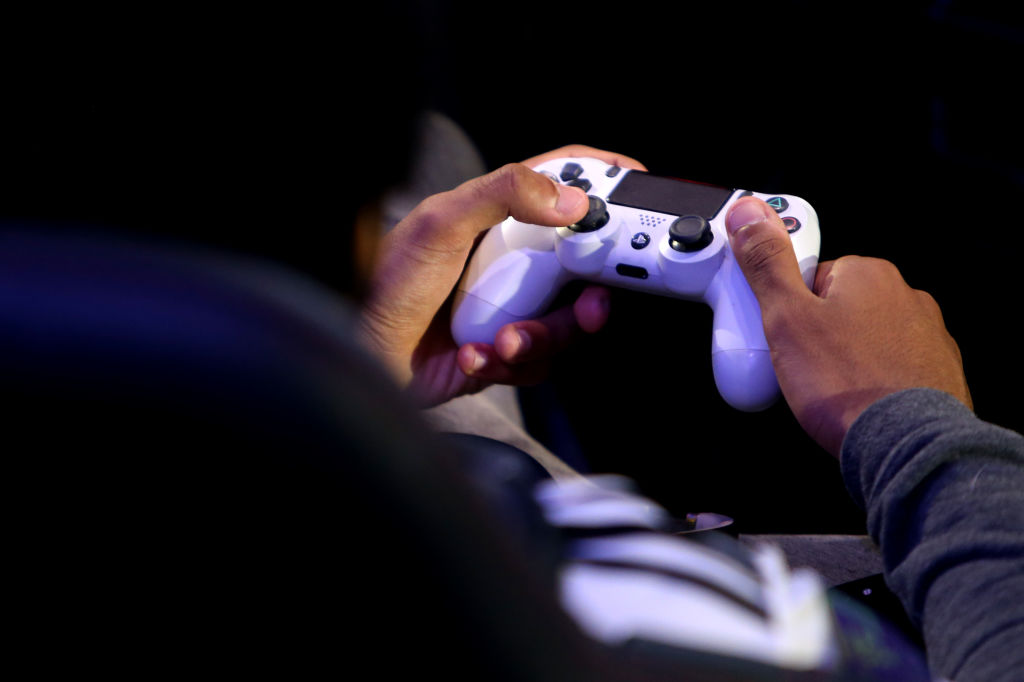 A detailed view of a PS4 controller as players practice during day one of the 2019 ePremier League Finals at Gfinity Arena on March 28, 2019 in London, England. (Getty Images&mdash;2019 Getty Images)