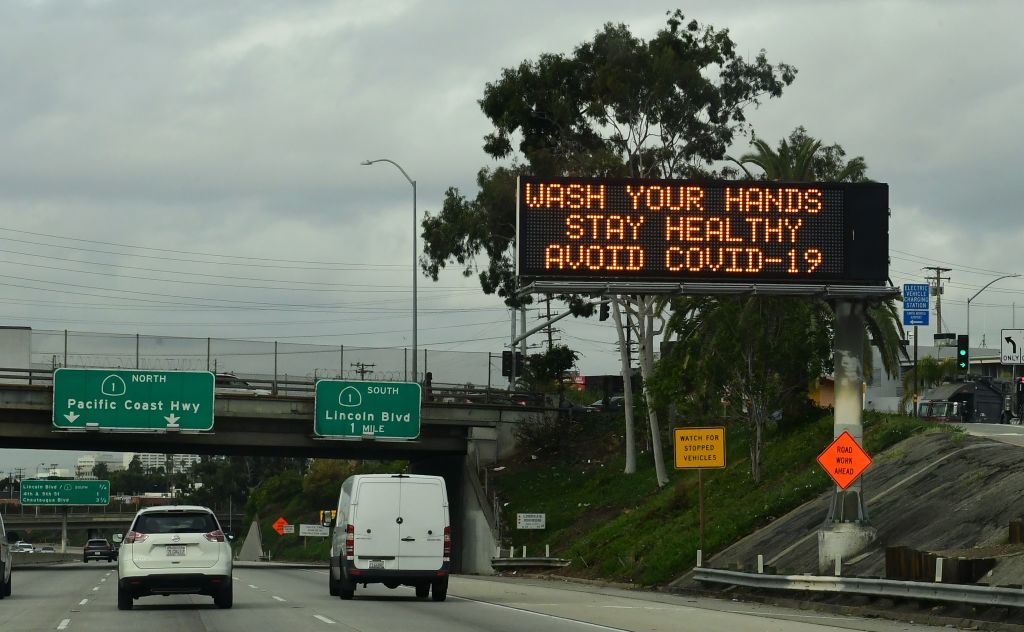 A traffic reminder to maintain personal hygiene greets drivers on a Los Angeles freeway on Mar. 16, 2020. (Frederic J. Brown—AFP/Getty Images)