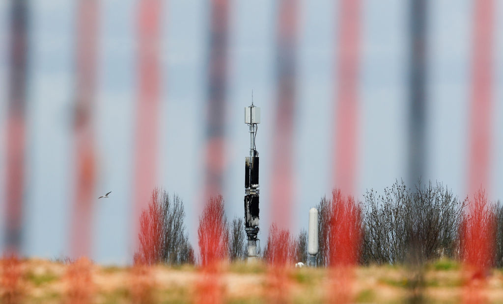 A fire-damaged telecom tower, reported in local media as being a 5G network mast, in Birmingham, U.K., on Monday, April 6, 2020. (Darren Staples/Bloomberg via Getty Images—© 2020 Bloomberg Finance LP)