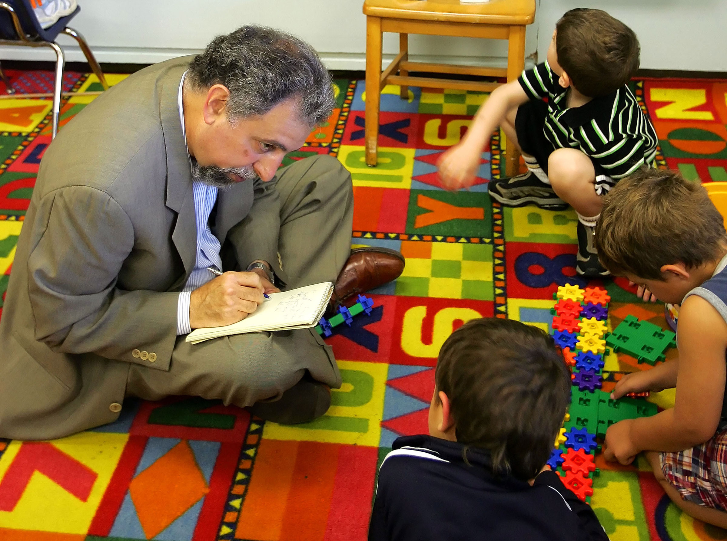 Alan Finder interviews kindergarten students at the Concord Road School in Ardsley, N.Y., on June 20, 2005. (Librado Romero—The New York Times/Redux)