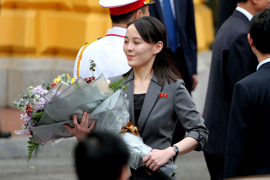 Kim Yo-Jong, sister of North Korean leader Kim Jong-Un, holds a flower bouquet during a welcoming ceremony at the Presidential Palace in Hanoi, Vietnam, on March 1, 2019. (Luong Thai Linh—Pool/Bloomberg)