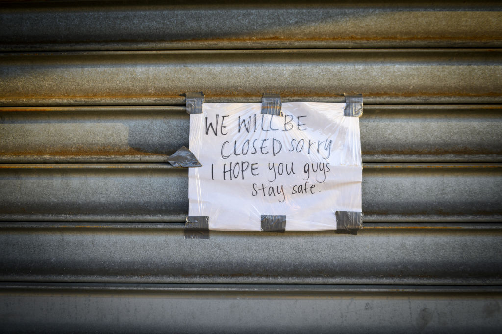 A sign reads outside a store on Metropolitan Avenue in the Queens borough of New York on April 7, 2020. (Christopher Occhicone—Bloomberg/Getty Images)