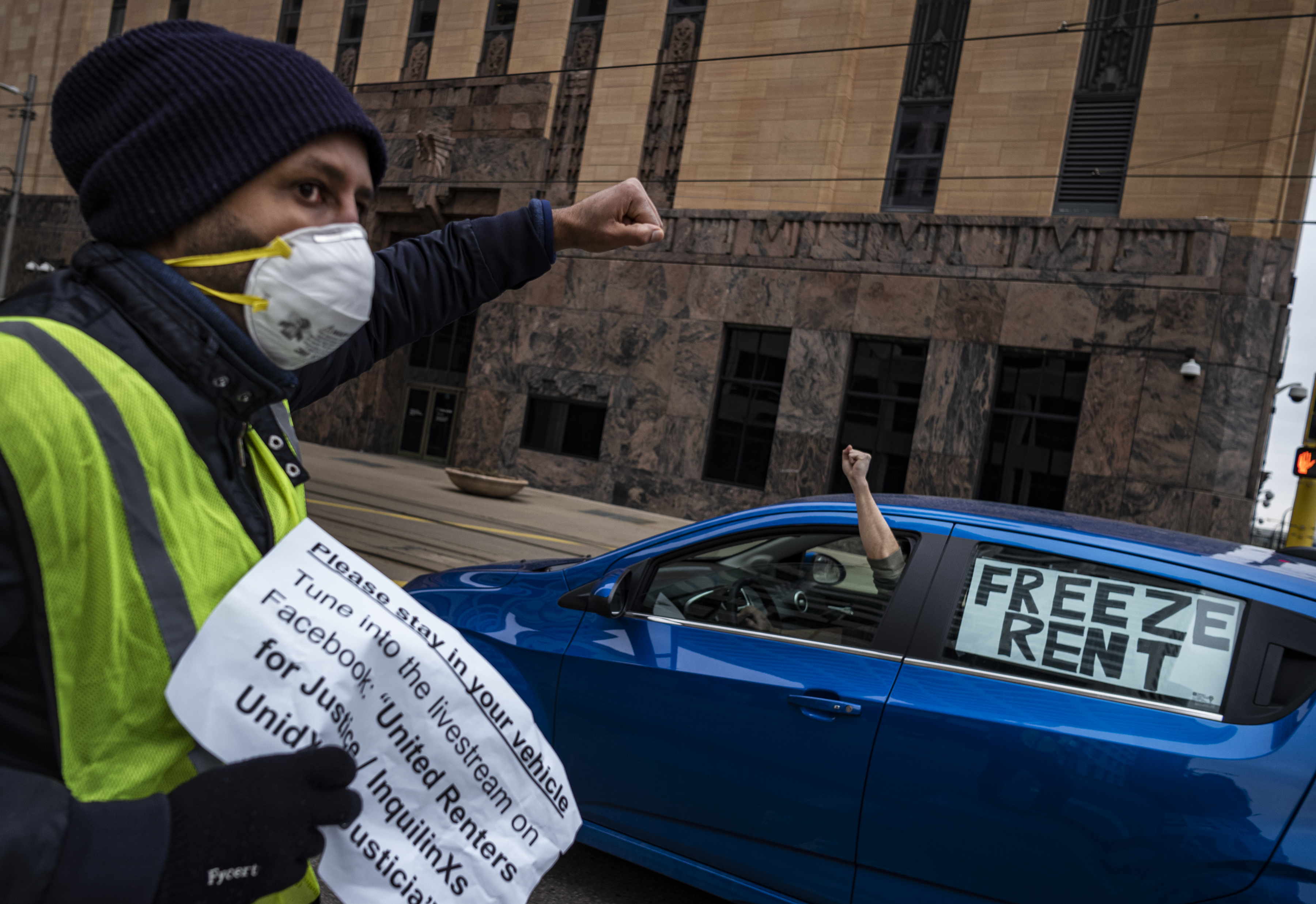 Tenant rights activist Nathan Sirdar helps lead a protest calling for relief for renters and homeowners during the coronavirus-related financial crisis, in Minneapolis, Minnesota on April 8, 2020. (Richard Tsong-Taatarii—Star Tribune/Getty Images)