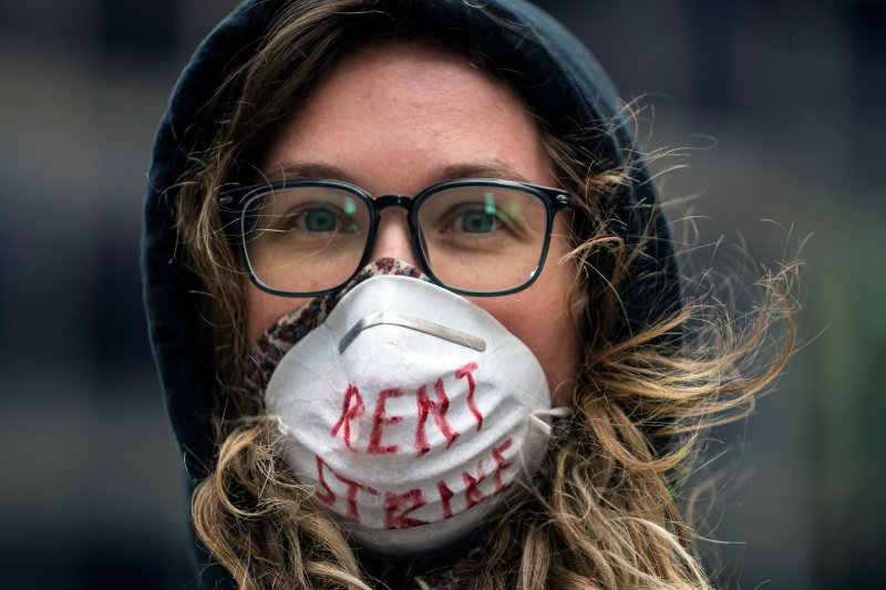 Karissa Stotts takes part in a protest calling for relief for renters and homeowners in Minneapolis, Minn., on April 8, 2020.