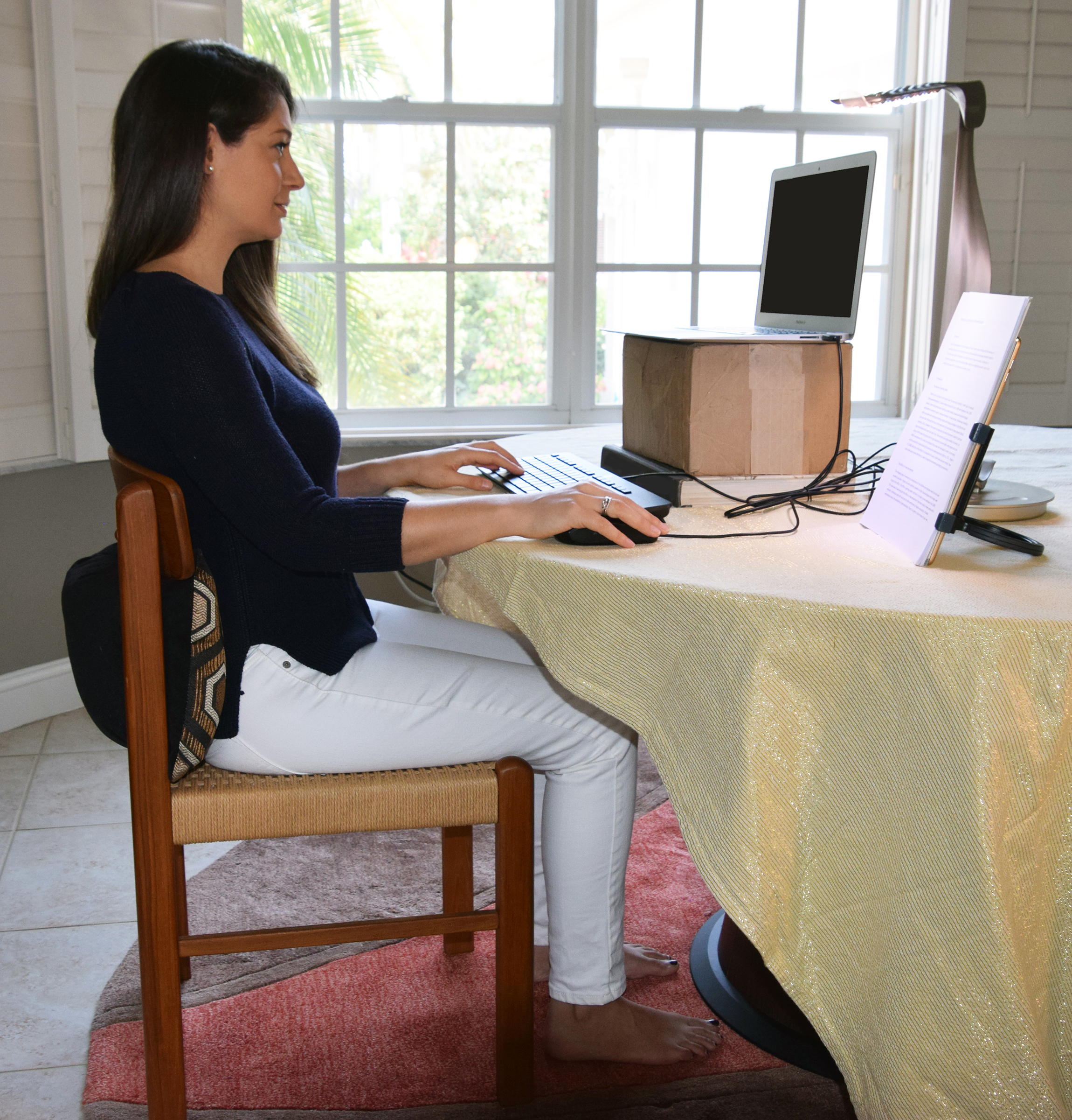 The author's daughter-in-law demonstrates optimal ergonomic posture. (Courtesy of Alan Hedge)