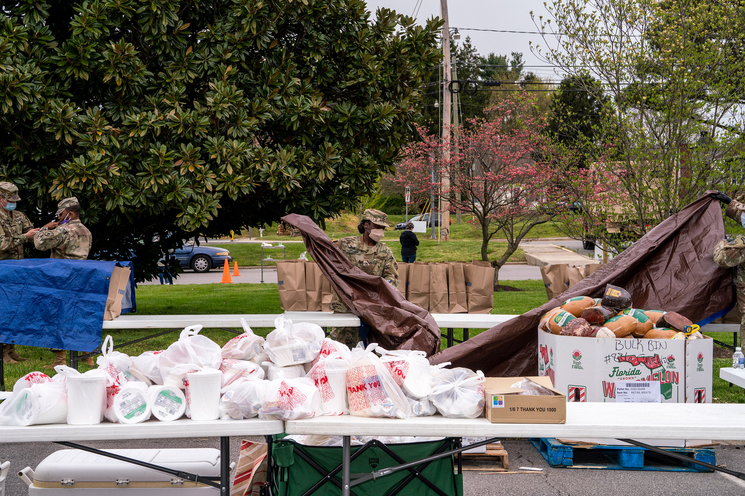 Maryland National Guard members prepare a food distribution site for the needy in Stevensville, Md., on April 17. (Peter van Agtmael—Magnum Photos for TIME)