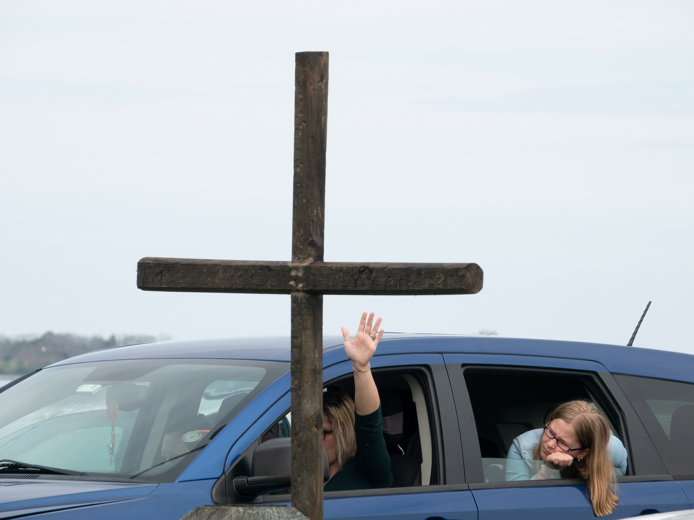 Worshipers pray at Jesus’ Church Sunday "Drive Thru" service in Great Marsh Park, Cambridge, Md., on April 5. (Peter van Agtmael—Magnum Photos for TIME)