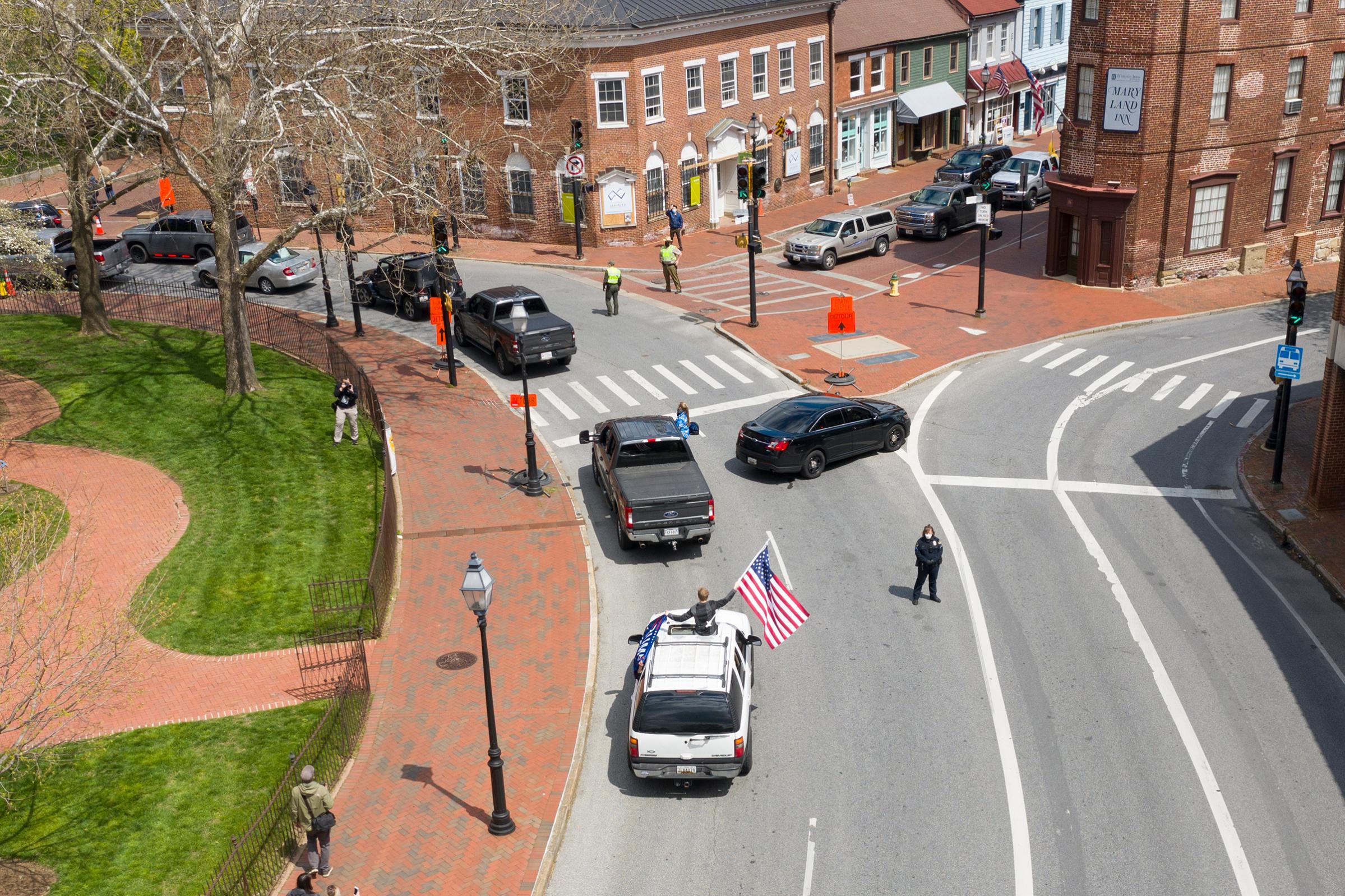 2020. USA. Annapolis, Maryland.  A caravan of cars descends on the Maryland State House in Annapolis on 4/18 to protest the Coronavirus (Covid 19) related restrictions to commerce and movement.
