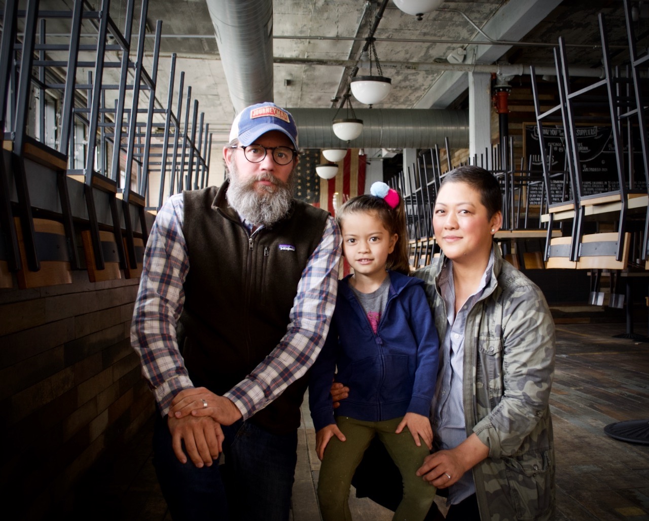 Bill and Johanna Welter, founders of Journeyman Distillery, and their daughter Islay.