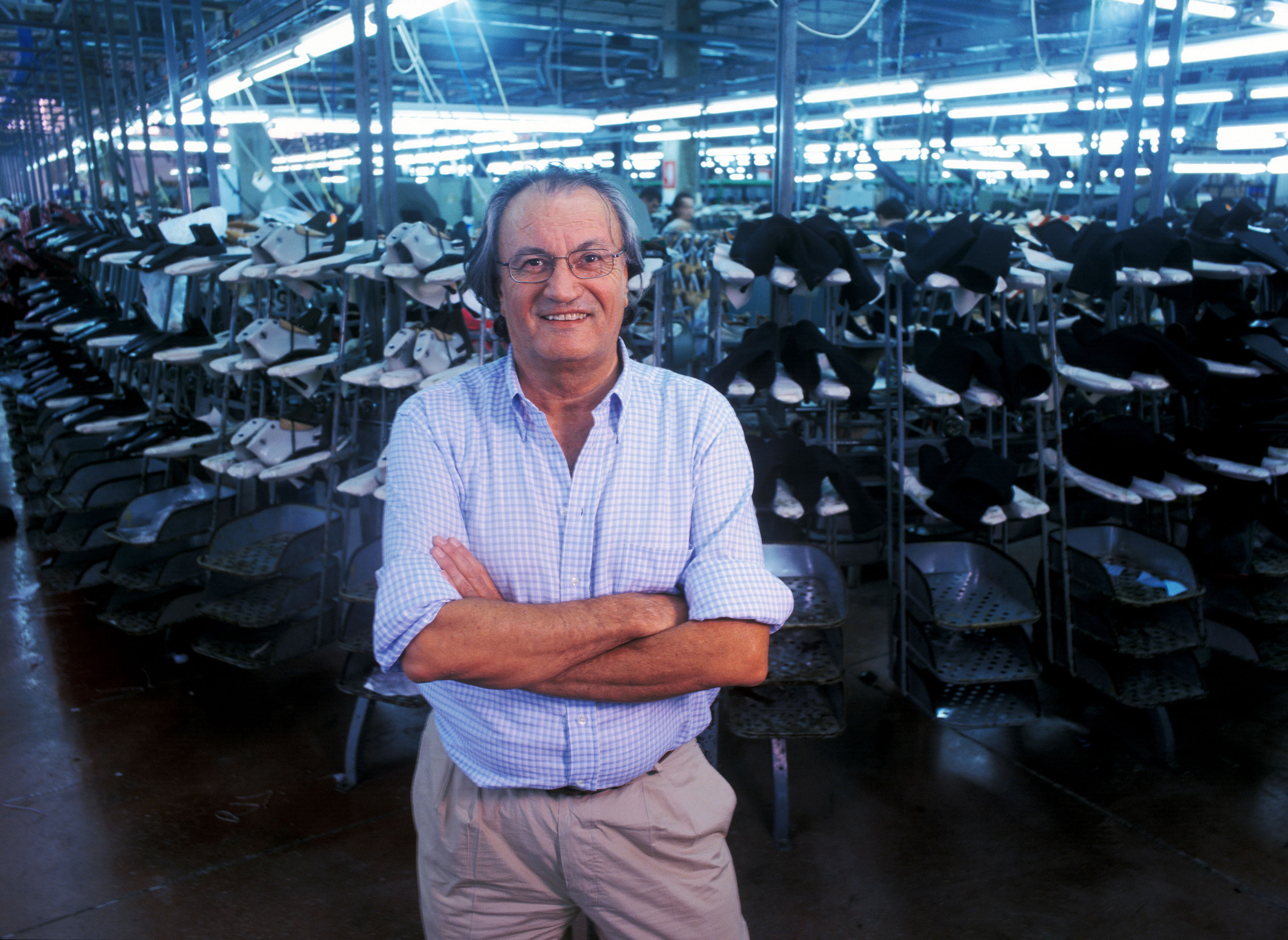 Sergio Rossi at a shoe factory in July 1999. (Donatello Brogioni—Contrasto/Redux)