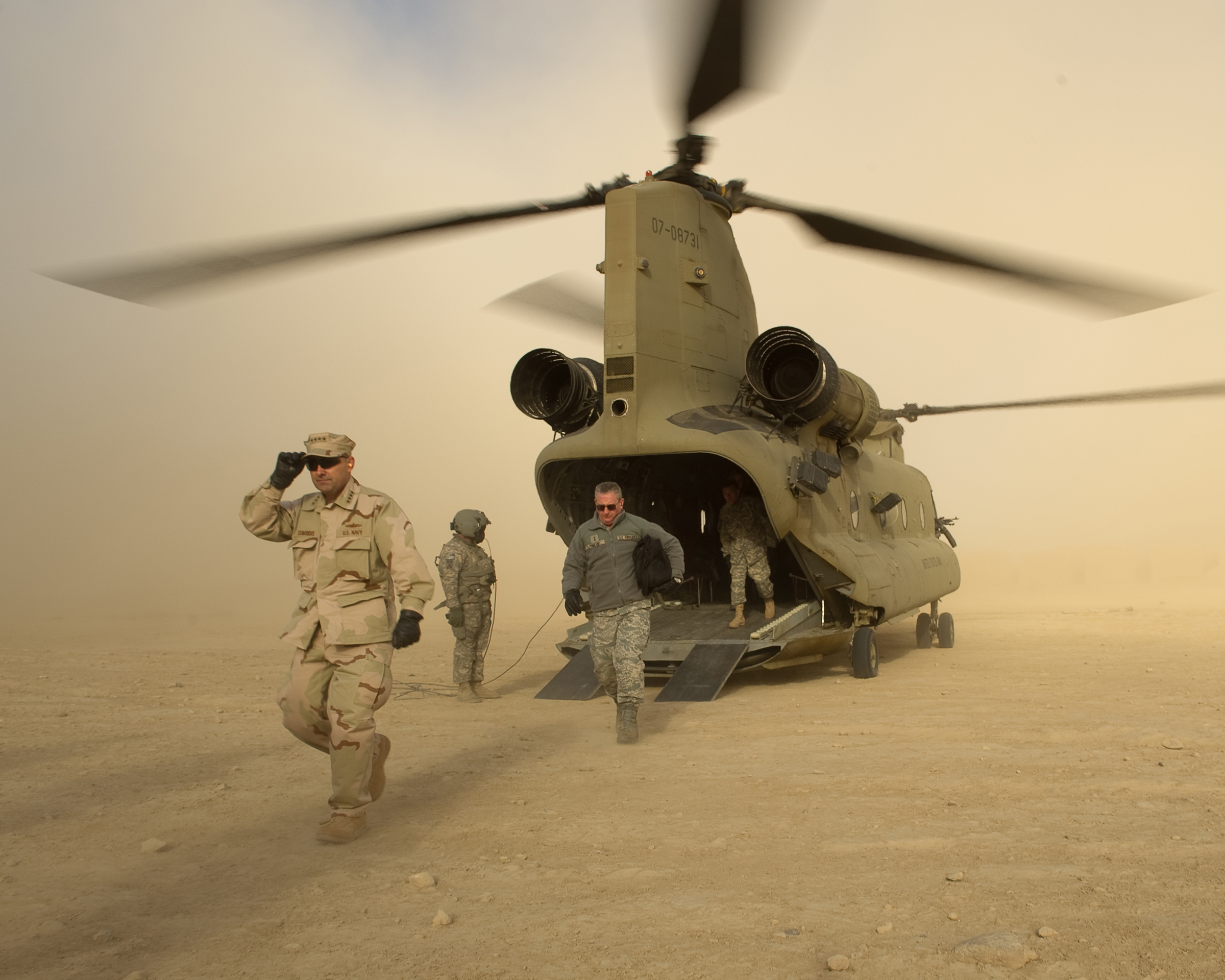 While Supreme Allied Commander of NATO, Admiral Stavridis dismounts a helicopter in Afghanistan outside of Khandahar in 2010. (RNLAF/NATO)