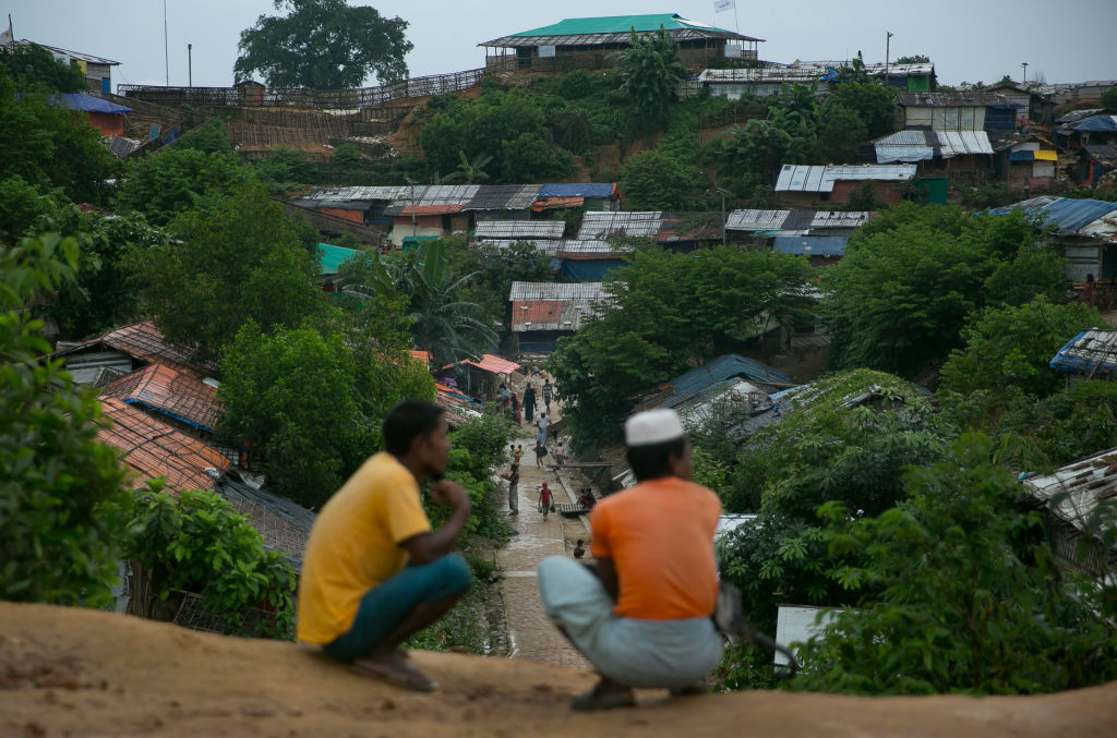 Two men look out over a Rohingya refugee camp in Cox's Bazar, Bangladesh on Aug. 24, 2019. (Allison Joyce&mdash; Getty Images)
