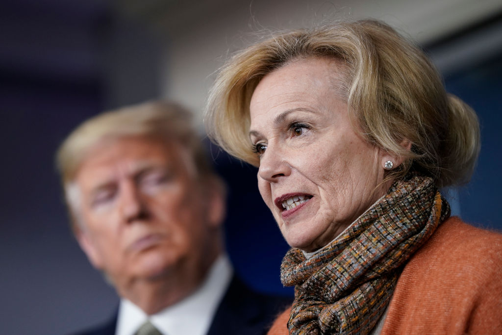President Donald Trump looks on as  White House Coronavirus Response Coordinator Dr. Deborah Birx speaks about the coronavirus outbreak in the press briefing room at the White House on March 17, 2020 in Washington, DC. (Drew Angerer—Getty Images)