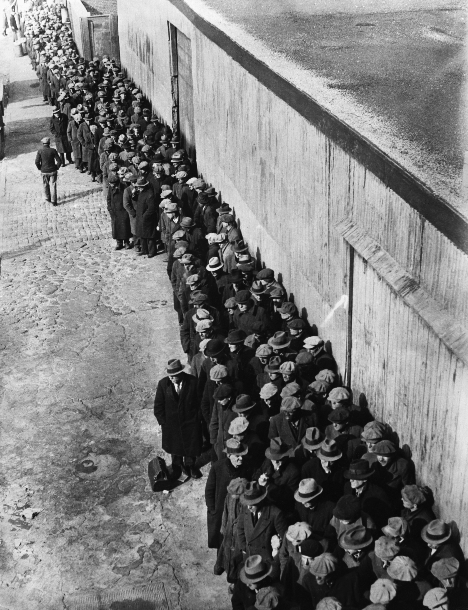 New Yorkers queue at a soup kitchen set up by Mayor La Guardia in 1935 (Corbis via Getty Images)