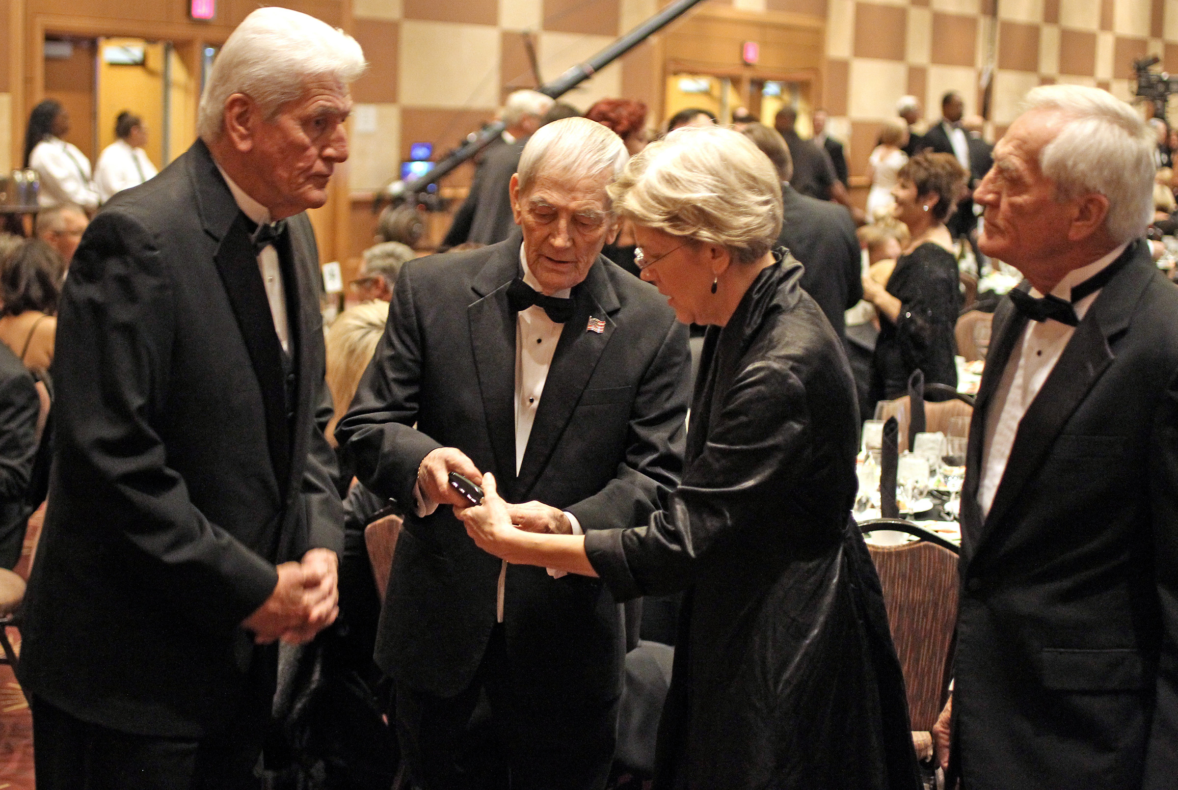 Elizabeth Warren with her three brothers in Oklahoma City in November 2011. Donald Reed Herring is center.