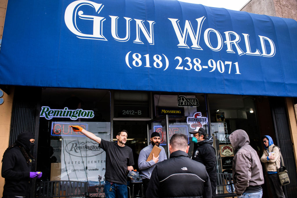 Shoppers wait in line to purchase ammunition and guns at Gun World in Burbank, California on March 17. (Sarah Reingewirtz—MediaNews Group—Pasadena Star-News/Getty Images)