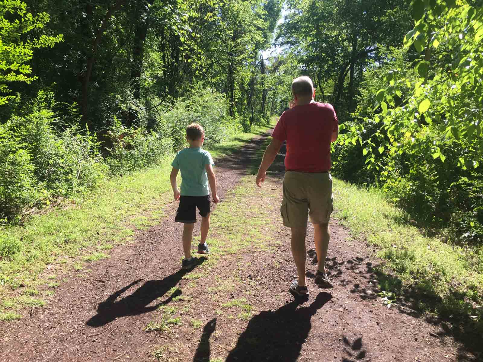 The author’s son and husband on a hike on April 11 (Courtesy Sarah Parcak)