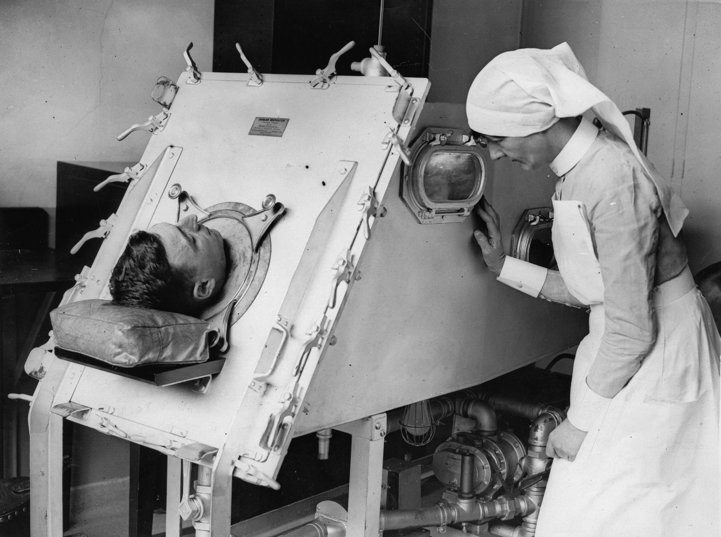 An iron lung. St. Bartholomews Hostpital. London. Photograph. About 1935.