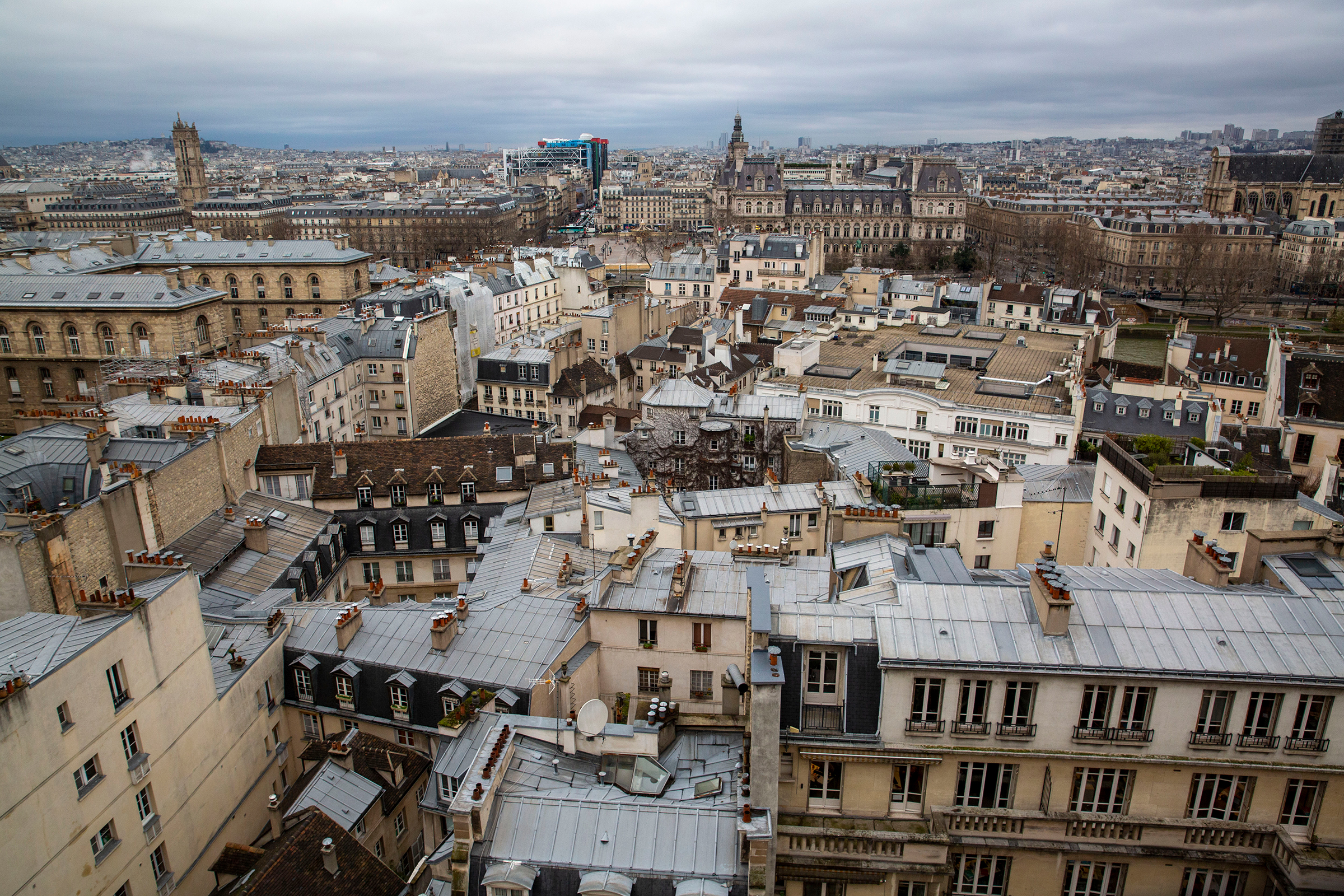A view of Paris from Notre-Dame on Jan. 9, 2020. With 67 million French under a national lockdown since March 17, the cathedral sits shuttered and deserted.