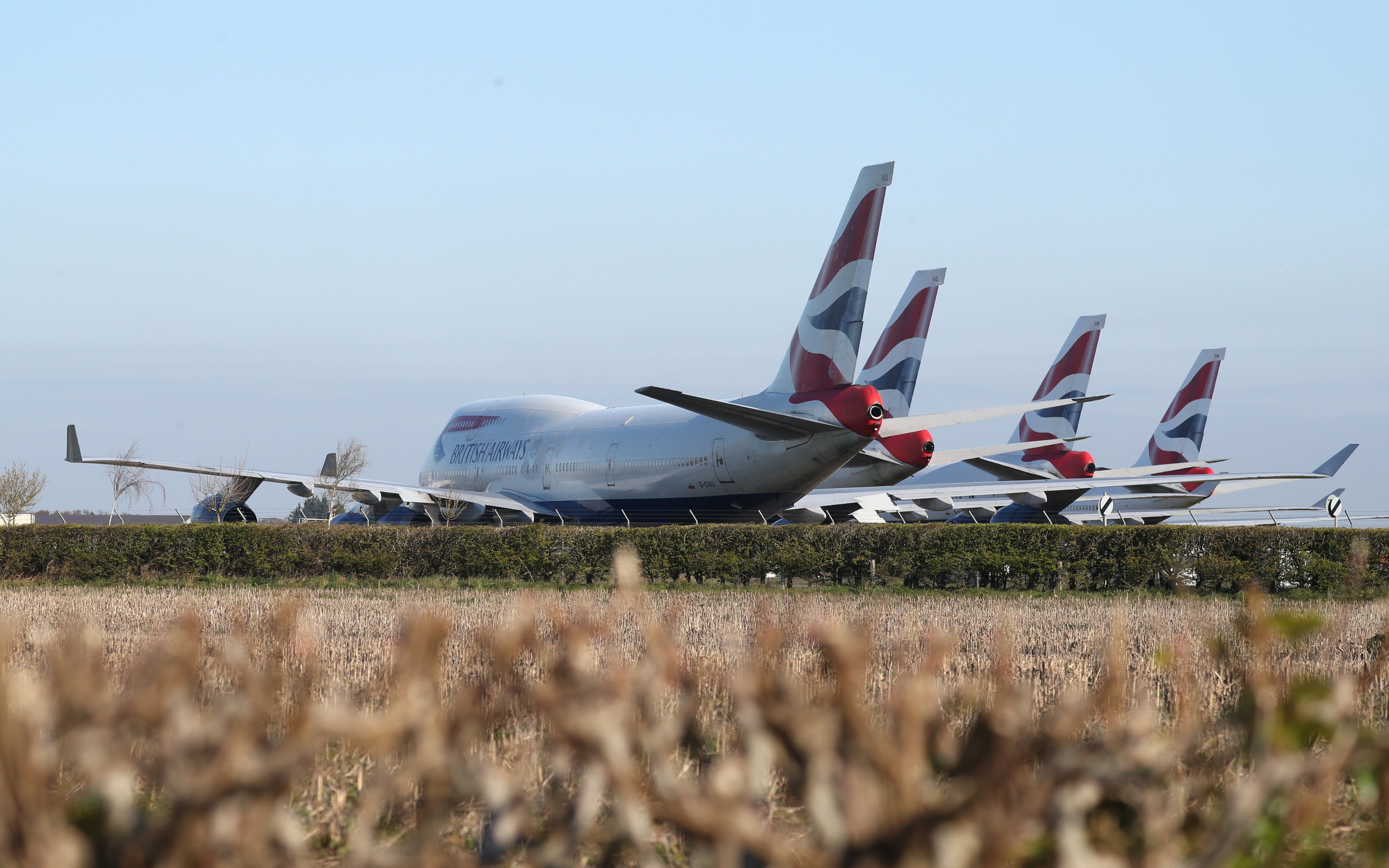 British Airways Boeing 747 aircraft parked at Bournemouth airport on April 1, 2020 after the airline reduced flights amid travel restrictions and a huge drop in demand as a result of the coronavirus pandemic. (Andrew Matthews—PA Images/Getty Images)