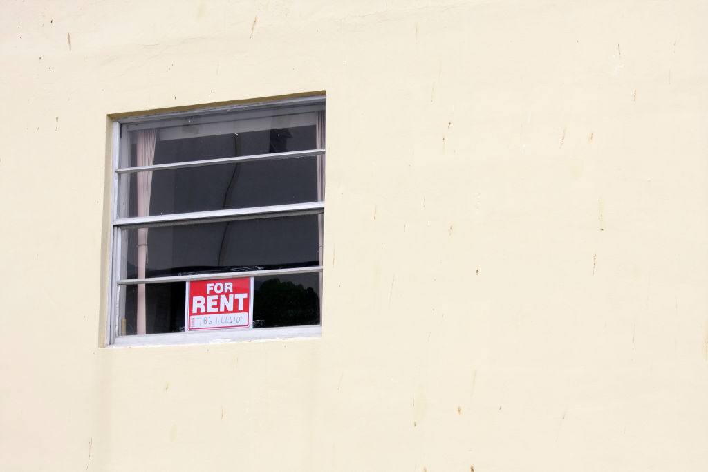 A for rent sign in the window of an apartment at Miami Beach.