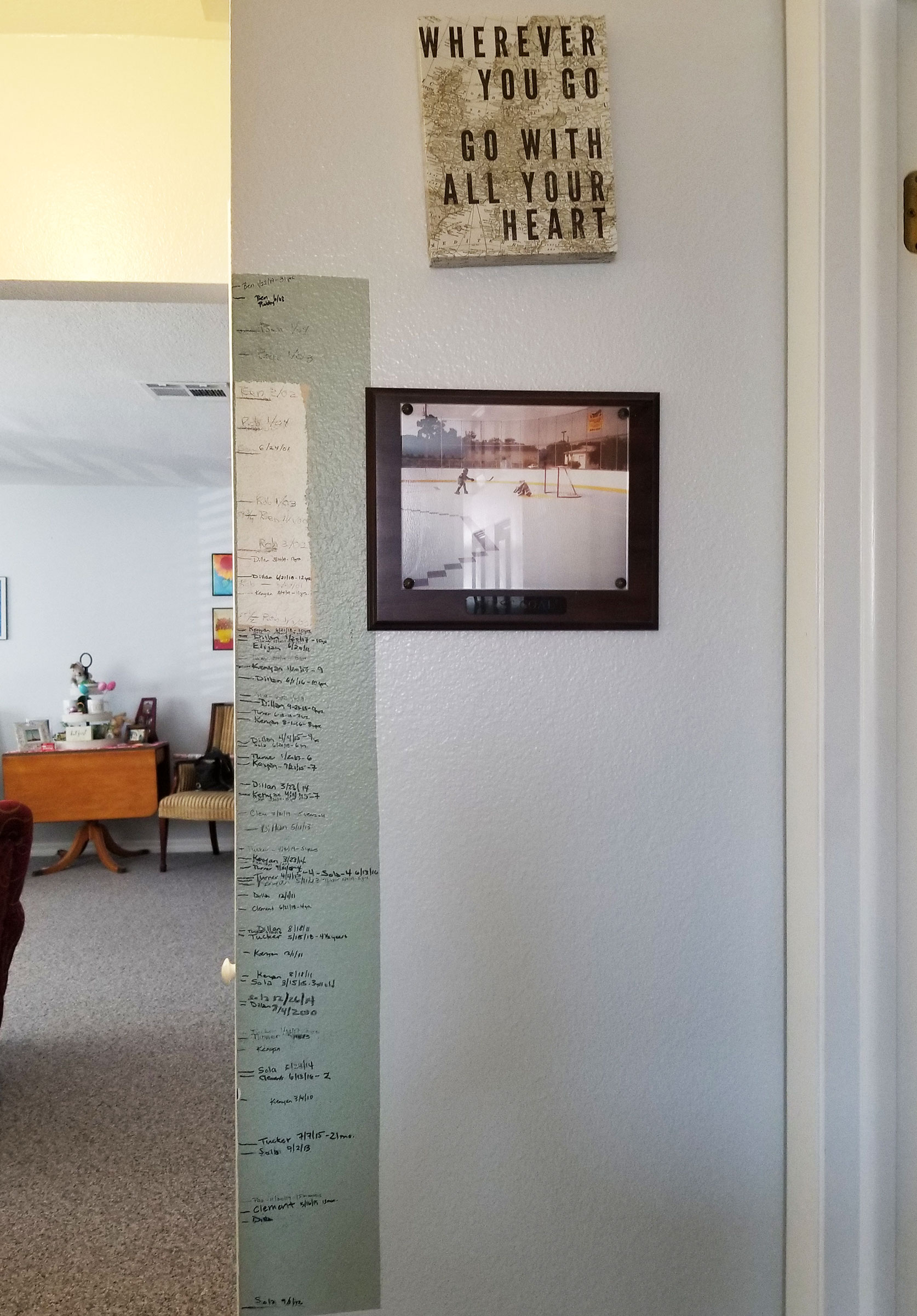 A wall in Mindy Pendleton's home showing the heights of her children