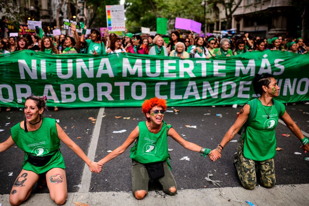 Women take part in a women's strike to demand the legalization of abortion, gender equality and the end of violence against women, in front of the Congress in Buenos Aires, on March 9, 2020. (Ronaldo Schemidt –AFP/Getty Images)