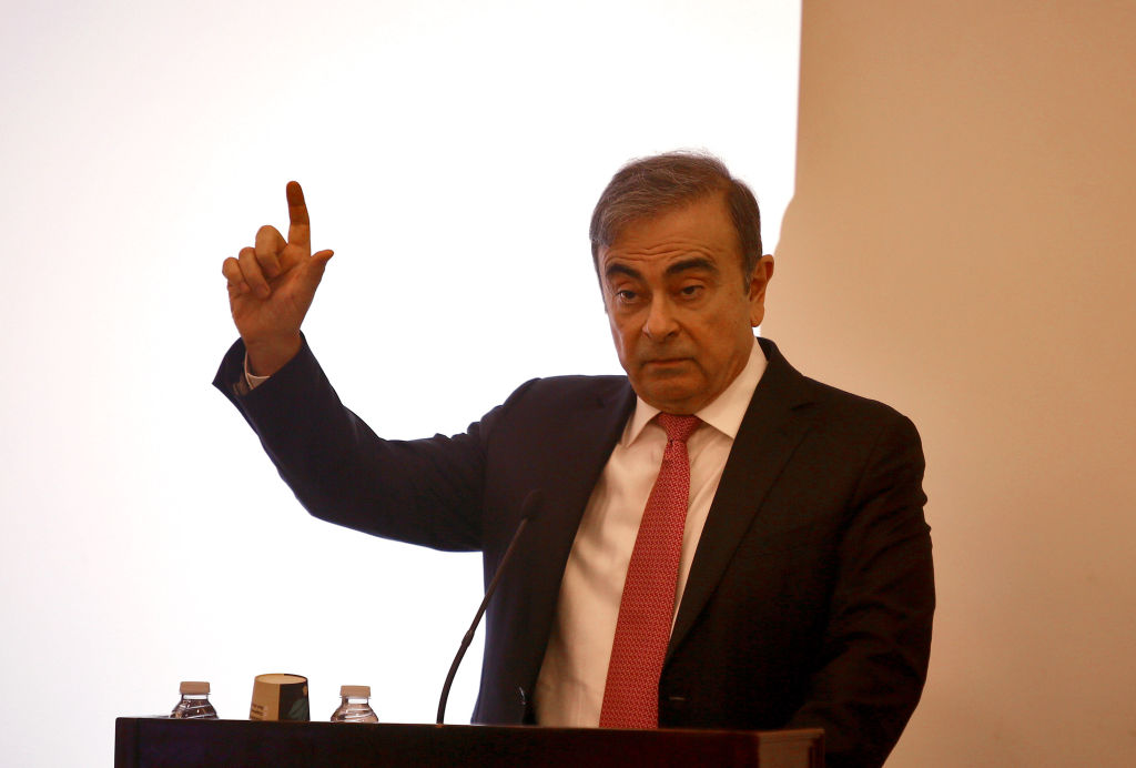Former Nissan chief Carlos Ghosn speaks at a press conference in Beirut, Lebanon, Jan. 8, 2020. Carlos Ghosn denied on Wednesday all accusations brought against him by Nissan, adding that he will fight until the end to prove his innocence, local TV channel MTV reported. (Bilal Jawich–Xinhua/Getty Images)