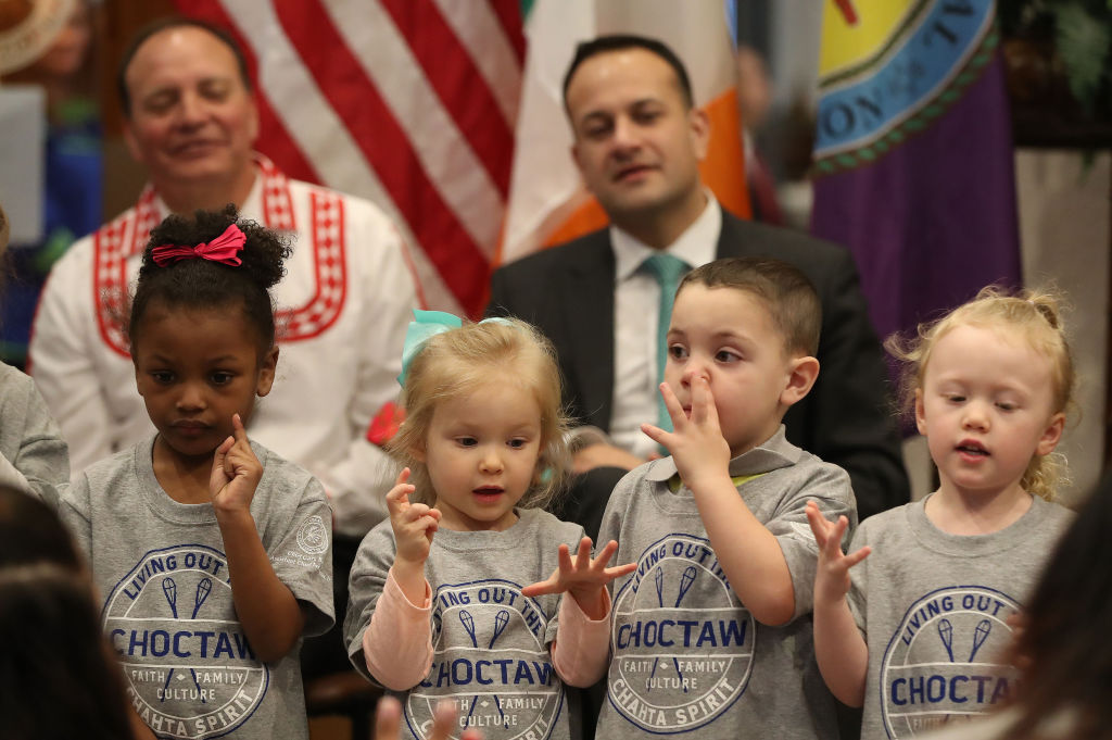 Taoiseach Leo Varadkar watches children from the Choctaw Nation child Development center at the Choctaw tribal council in the Main Hall in Oaklahoma on day two of his week long visit to the United States of America. (Niall Carson—Getty)