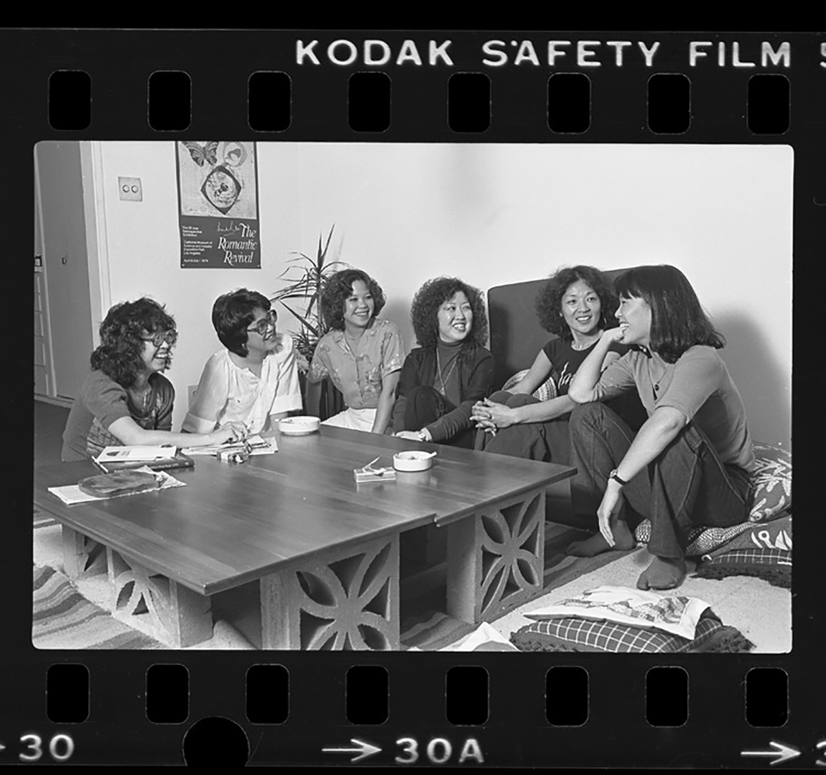 Members of Pacific Asian American Women Writers West, from left, Momoko Iko, Joyce Nako, Karen Saito, Miya Iwataki, Emma Gee and Diane Takei, meeting in Los Angeles in 1980 (Gary Friedman—Los Angeles Times Photographic Archive/UCLA Library)