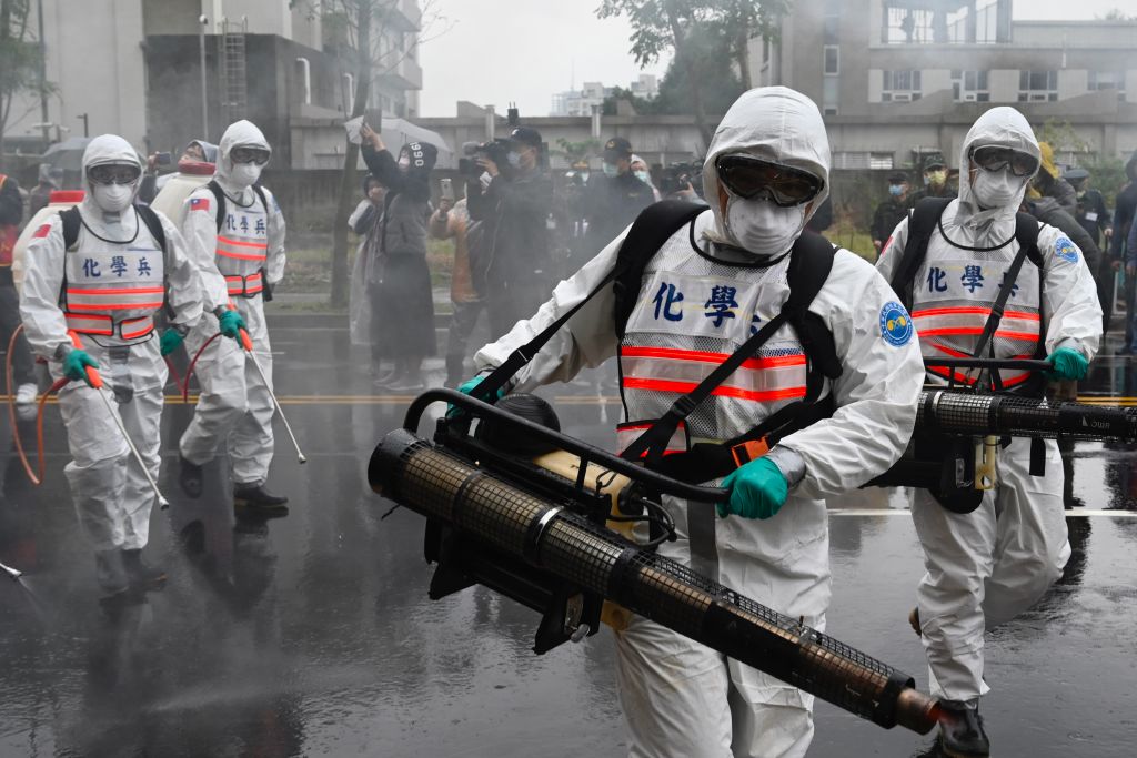 Soldiers take part in a drill organized by the New Taipei City government to prevent the spread of COVID-19  in Xindian district on March 14, 2020. (Sam Yeh—AFP/Getty Images)