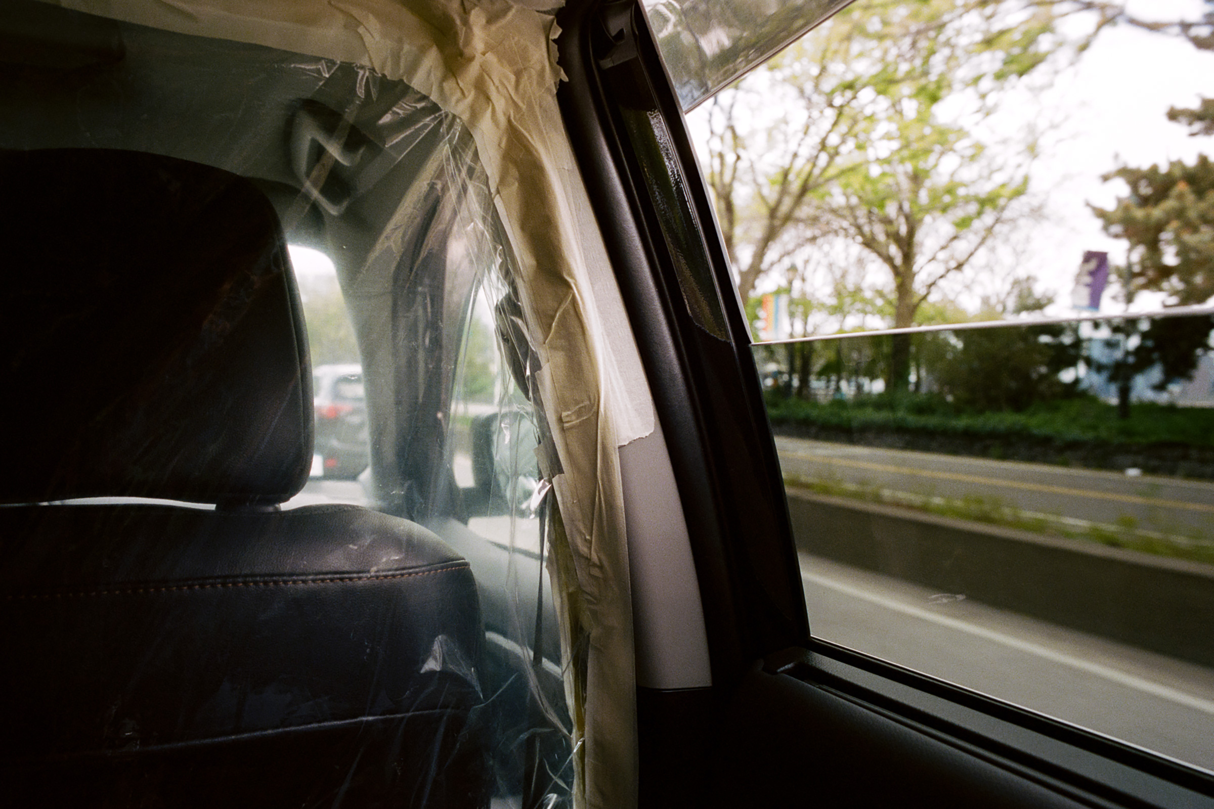 A handmade plastic partition in an Uber in New York City on May 2. (Andre D. Wagner for TIME)