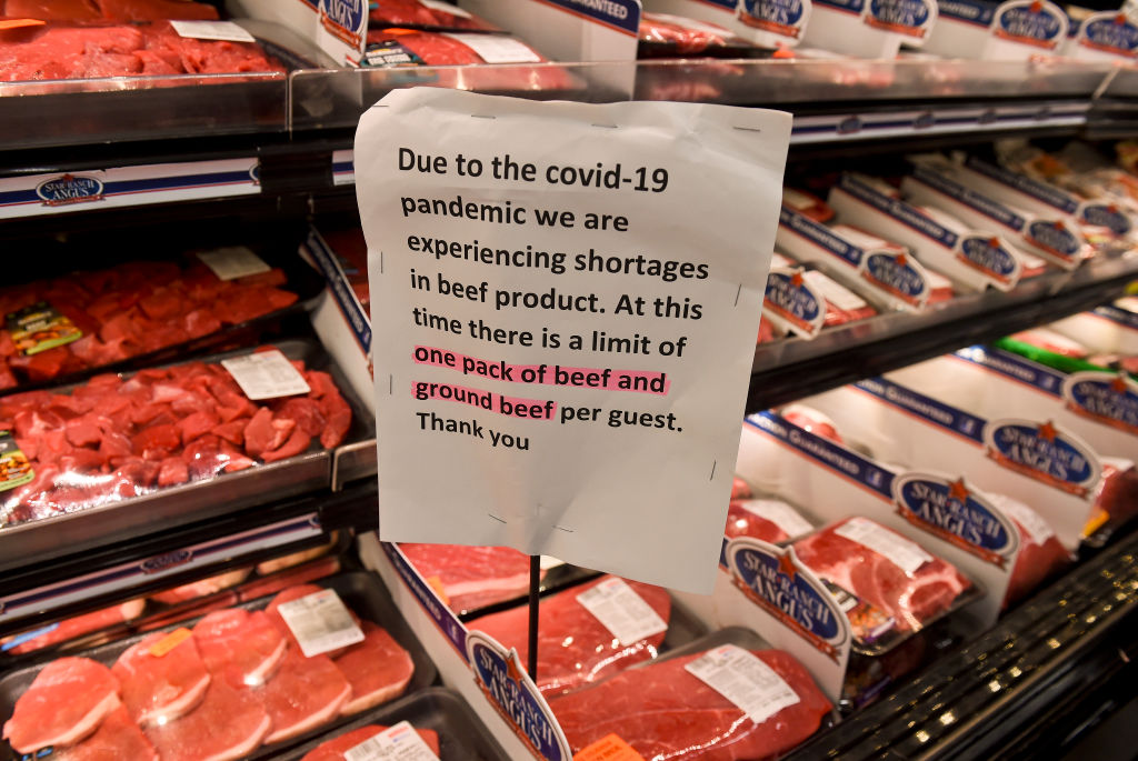 A sign with beef products that reads "Due to the covid-19 pandemic we are experiencing shortages in beef product. At this time there is a limit of one pack of beef and ground beef per guest. Thank you." In the meat department at the Redner's Warehouse Market in Wyomissing Friday afternoon May 8, 2020 where they have signs limiting the purchase of chicken, beef, and pork due to a shortage, and as a way to discourage panic buying during the coronavirus outbreak. (Ben Hasty–MediaNews Group/Reading Eagle/Getty Images)