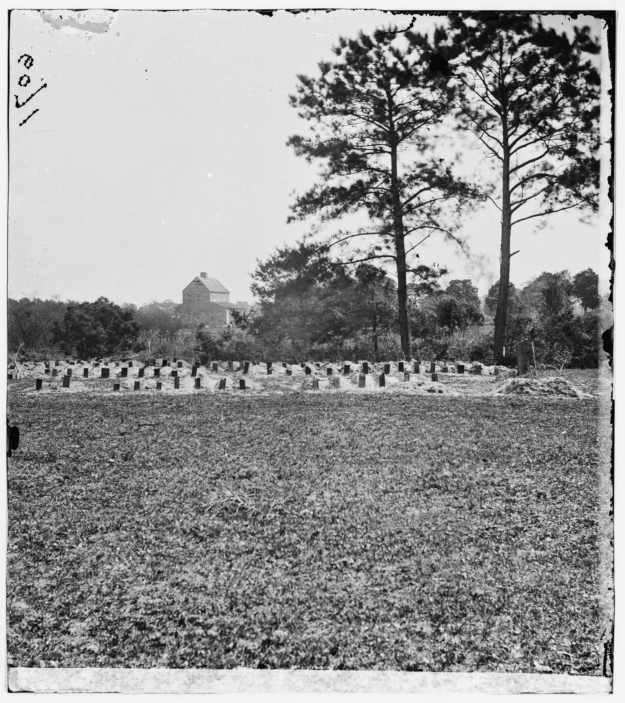 An April 1865 photo of the graves of Union soldiers buried at the race course-turned-Confederate-prison where historians believe the earliest Memorial Day ceremony took place. (Civil war photographs, 1861-1865, Library of Congress, Prints and Photographs Division)