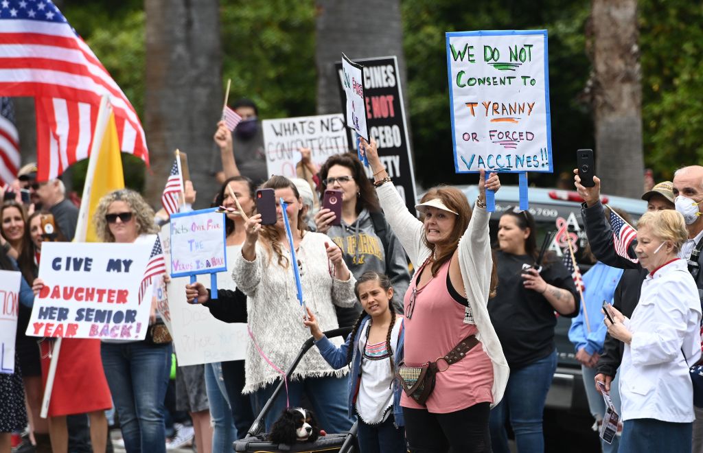 Hundreds of people gather to protest the lockdown in spite of shelter-in-place rules still being in effect at California's state capitol building in Sacramento, California on April 20, 2020. (Josh Edelson—AFP/ Getty Images)
