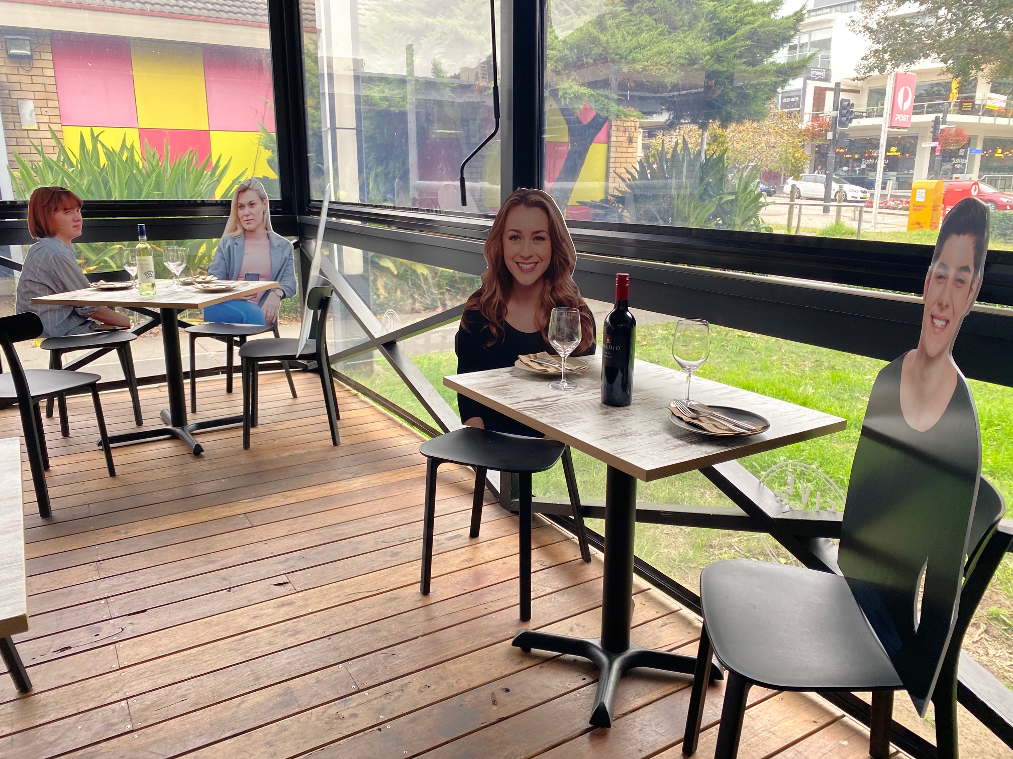Cardboard cutout figures at Five Dock Dining in Five Dock, Australia. (Photo courtesy of Frank Angilletta/Five Dock Dining)