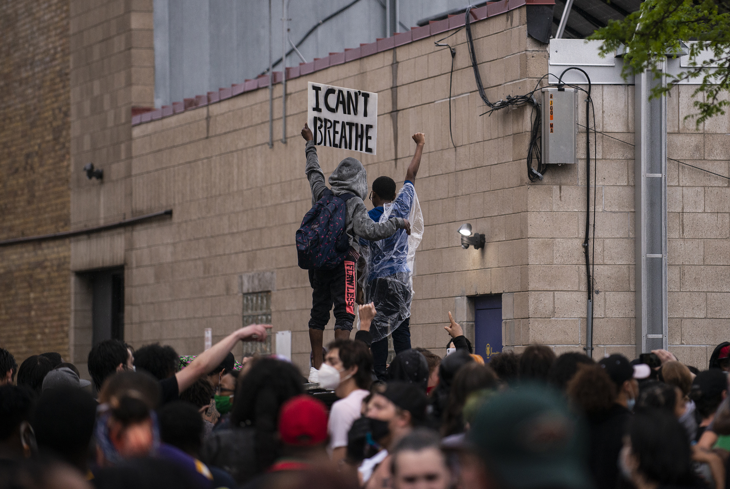 Protesters demonstrate against the death of George Floyd outside the 3rd precinct on May 26. (Stephen Maturen—Getty Images)