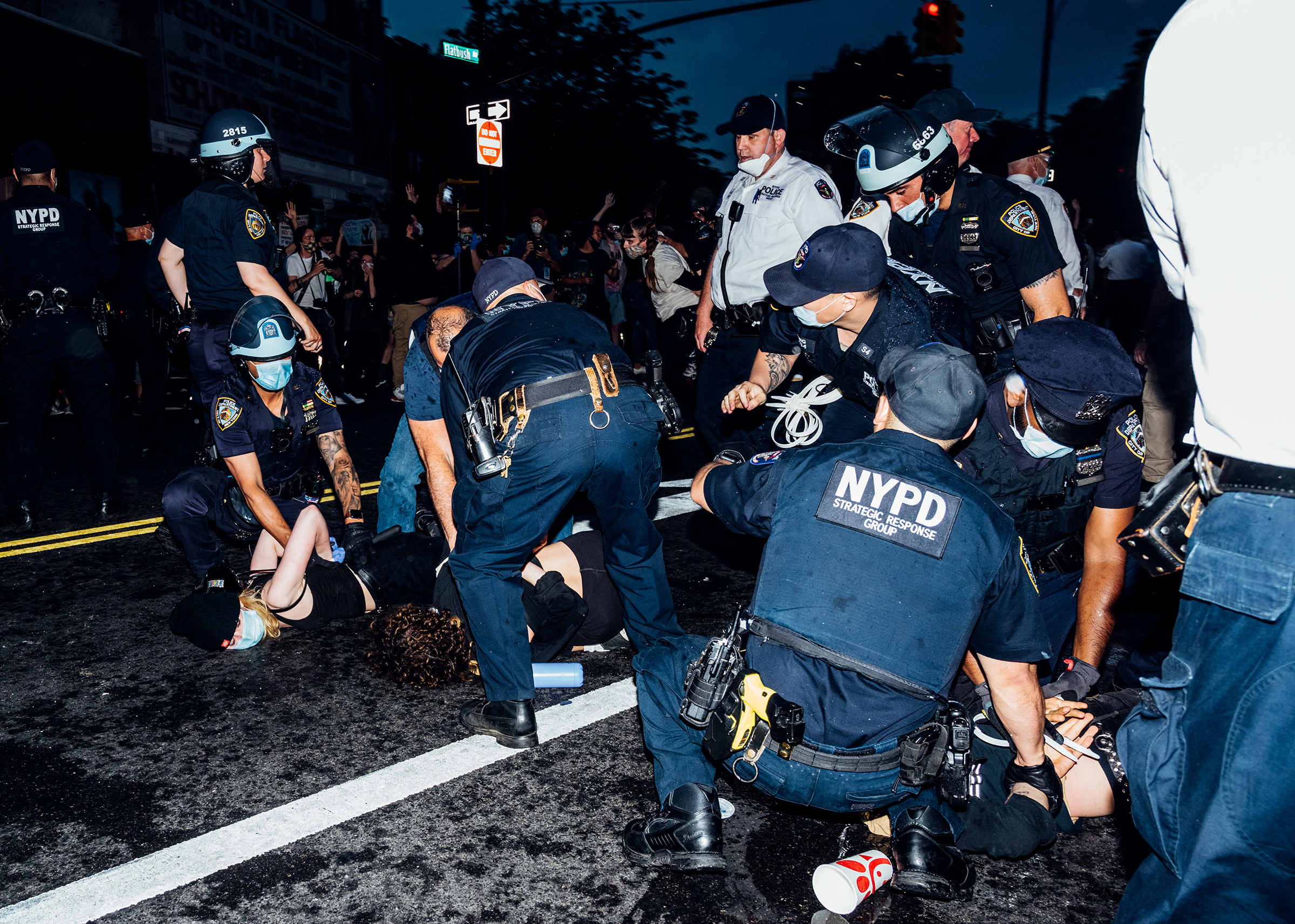 Demonstrators are detained during a protest near Brooklyn's Barclays Center on May 29. (Malike Sidibe for TIME)