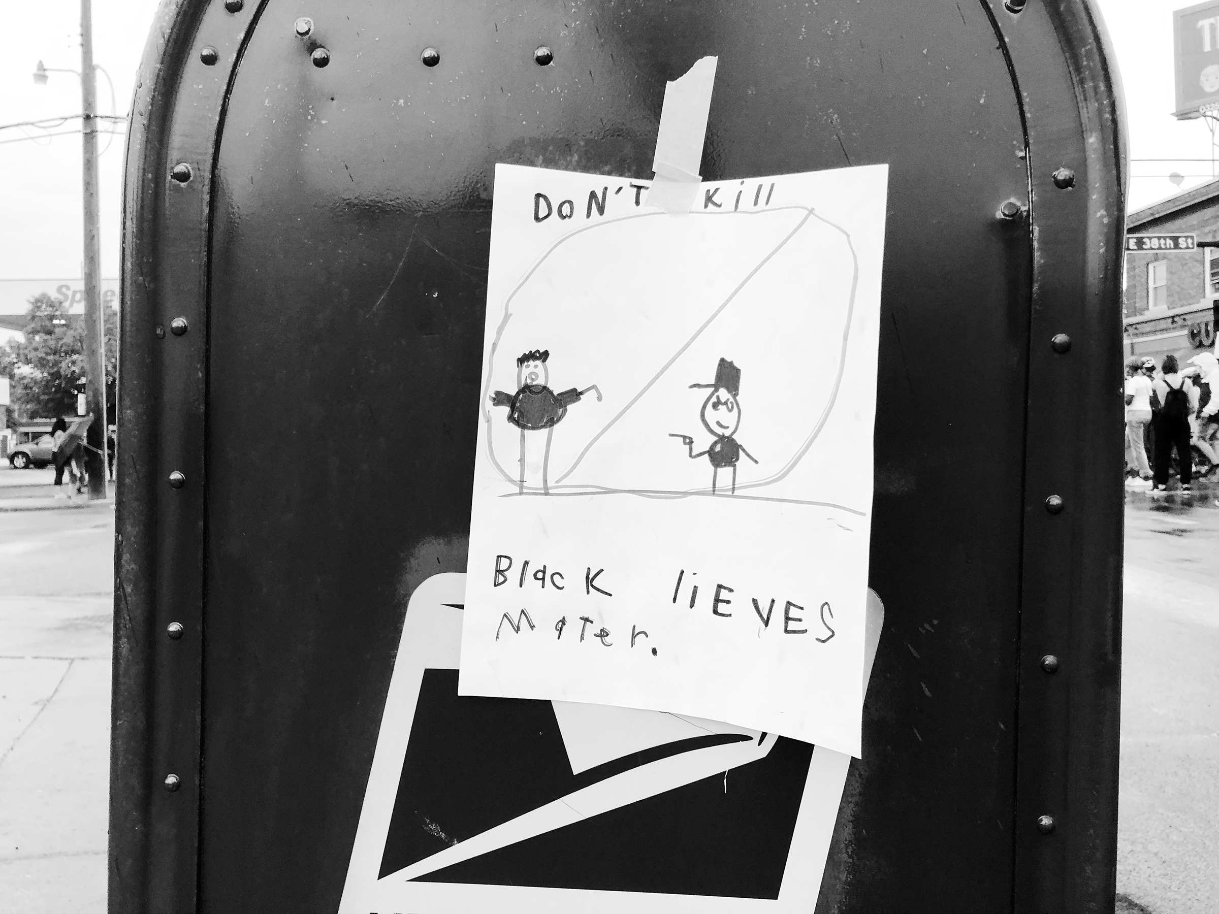 A child's drawing on a mailbox in Minneapolis on May 27. (Patience Zalanga)